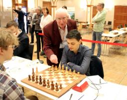 Symbolic first move on the board by Dmitrij Kollars by Guenter Ramthor (Ramthor Foundation)